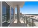 Balcony with glass railing overlooking a beach with an ocean view at 15 Avalon St # 601, Clearwater Beach, FL 33767