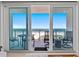 Relaxing balcony space with seating, offering stunning views of the beach at 15 Avalon St # 601, Clearwater Beach, FL 33767