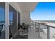 Large balcony provides panoramic views of the coastline, with seating at 15 Avalon St # 601, Clearwater Beach, FL 33767