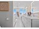 Luxurious bathroom featuring double vanity, soaking tub, and natural light at 15 Avalon St # 601, Clearwater Beach, FL 33767