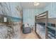Comfortable bedroom with bunkbeds and a beach-themed accent wall at 15 Avalon St # 601, Clearwater Beach, FL 33767