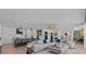 Open concept living room and kitchen area with an ocean view at 15 Avalon St # 601, Clearwater Beach, FL 33767