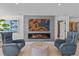 Contemporary living room with a fireplace at 15 Avalon St # 601, Clearwater Beach, FL 33767
