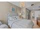 Inviting main bedroom featuring neutral tones and calming decor at 15 Avalon St # 601, Clearwater Beach, FL 33767