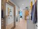 Elaborate walk-in closet featuring custom storage solutions and ample natural light at 15 Avalon St # 601, Clearwater Beach, FL 33767