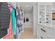 Well-organized walk-in closet with custom shelving and ample storage space at 15 Avalon St # 601, Clearwater Beach, FL 33767