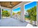 Wide balcony with dark metal railings and a wood-paneled ceiling at 1741 Nevada Ne Ave, St Petersburg, FL 33703