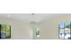Bright bedroom with modern lighting fixtures and large windows for ample natural light at 1741 Nevada Ne Ave, St Petersburg, FL 33703