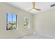 Well-lit bedroom with two large windows offering natural light at 1741 Nevada Ne Ave, St Petersburg, FL 33703