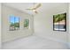 Open bedroom with marble floors and lots of natural light from the three windows at 1741 Nevada Ne Ave, St Petersburg, FL 33703