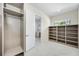 Walk-in closet with built-in storage solutions and natural light at 1741 Nevada Ne Ave, St Petersburg, FL 33703