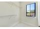 Bright closet with shelving and a window offering natural light at 1741 Nevada Ne Ave, St Petersburg, FL 33703