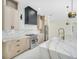 Modern kitchen with marble backsplash and countertops, stainless steel appliances, and custom cabinets at 1741 Nevada Ne Ave, St Petersburg, FL 33703