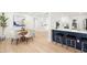 Open floor plan featuring dining area, bar seating, and modern kitchen at 2117 S West Shore Blvd, Tampa, FL 33629