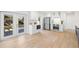 Bright kitchen with stainless steel appliances and white cabinetry with glass doors at 2117 S West Shore Blvd, Tampa, FL 33629