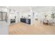 Open concept featuring modern kitchen with dining area and bright living room at 2117 S West Shore Blvd, Tampa, FL 33629