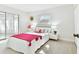 Bright bedroom with natural light, slider door access to lanai, creating a serene and inviting retreat at 2124 Crowsnest Dr, Palm Harbor, FL 34685