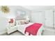 Bright bedroom with natural light, ceiling fan and ample closet space creates a peaceful retreat at 2124 Crowsnest Dr, Palm Harbor, FL 34685