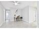 Bright room features tile flooring and a desk creating an ideal workspace or flexible living area at 2124 Crowsnest Dr, Palm Harbor, FL 34685