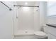 Modern bathroom featuring a walk-in shower with white subway tiles and neutral flooring at 21385 Darter Rd, Land O Lakes, FL 34638