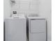 Convenient laundry room equipped with a modern washer and dryer for easy laundry days at 21385 Darter Rd, Land O Lakes, FL 34638
