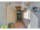 Inviting front entrance with a brick walkway, a garden pot, and a stylish front door at 2542 Clareside Dr, Valrico, FL 33596