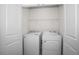 Laundry room featuring a washer and dryer at 2892 Beluga Bay Dr, Odessa, FL 33556