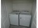 Conveniently located laundry room with a full-size washer and dryer at 2892 Beluga Bay Dr, Odessa, FL 33556