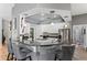 A gourmet kitchen is complete with granite countertops, stainless steel appliances, and bar seating, creating a delightful space at 3003 Magdalene Woods Dr, Tampa, FL 33618