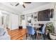 Stylish dining area with a built-in wine rack, and a view into the kitchen, perfect for meals and gatherings at 309 E Emma St, Tampa, FL 33603