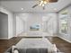 Bright living room with hardwood floors, neutral paint, and an open floor plan is move-in ready at 34411 Sahalee Loop, Dade City, FL 33525