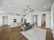 Open-concept living room and kitchen area with modern appliances and a spacious layout at 34411 Sahalee Loop, Dade City, FL 33525