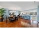 Spacious dining room with hardwood floors and an open layout to the kitchen at 442 Sandy Hook Rd, Treasure Island, FL 33706
