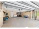 Spacious garage with storage solutions for bikes and recreational equipment at 442 Sandy Hook Rd, Treasure Island, FL 33706