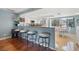 Open kitchen featuring a breakfast bar, stainless steel appliances, and plenty of counter space at 442 Sandy Hook Rd, Treasure Island, FL 33706