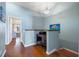 Upstairs loft area with a wooden desk, perfect for a home office or study space at 442 Sandy Hook Rd, Treasure Island, FL 33706