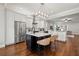 Open kitchen featuring stainless steel appliances and an island with barstool seating at 445 29Th N Ave, St Petersburg, FL 33704