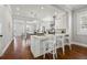 Spacious eat-in kitchen with white cabinets, stainless steel appliances, and hardwood floors at 445 29Th N Ave, St Petersburg, FL 33704
