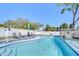 Inviting backyard pool area with secure fencing, offering relaxation and recreation at 4489 57Th N Ave, St Petersburg, FL 33714