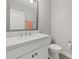 Cozy bathroom features white cabinetry, modern fixtures, and a quartz countertop at 5120 Bridge St # 6, Tampa, FL 33611