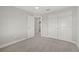 Neutral bedroom with carpet, closet, and ceiling fan at 5120 Bridge St # 6, Tampa, FL 33611