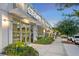 Exterior facade of a spa with ample windows and lush landscaping on a sunny day at 5120 Bridge St # 6, Tampa, FL 33611