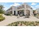 The facade of the building boasts modern architectural elements with clean lines and a welcoming sidewalk at 5120 Bridge St # 6, Tampa, FL 33611