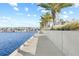 Scenic waterfront view of boats docked along a modern sidewalk and building at 5120 Bridge St # 6, Tampa, FL 33611