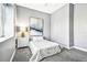 Cozy bedroom with a neutral color palette, plush carpeting, and natural light, creating a relaxing and inviting space at 5384 Mira Vista Dr, Palm Harbor, FL 34685