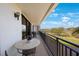Relax on this covered balcony with a view at 5700 Escondida S Blvd # 506, St Petersburg, FL 33715