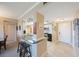 Galley kitchen with counter seating and stainless steel appliances at 5700 Escondida S Blvd # 506, St Petersburg, FL 33715