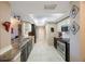 Galley kitchen features stainless appliances and granite counters at 5700 Escondida S Blvd # 506, St Petersburg, FL 33715