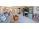 Comfortable living room with dining and kitchen area, modern decor, and soft neutral color palette at 5700 Escondida S Blvd # 506, St Petersburg, FL 33715