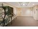 Elegant lobby area featuring well maintained carpet and decor and direct elevator access at 5700 Escondida S Blvd # 506, St Petersburg, FL 33715